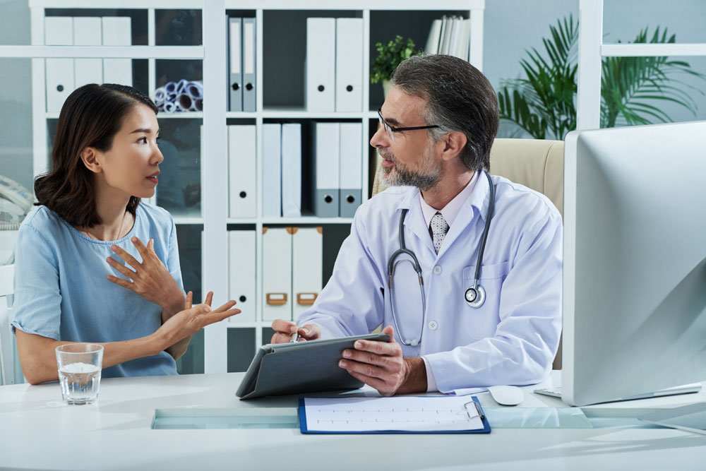 International patient getting an online second opinion from a doctor in India before travelling