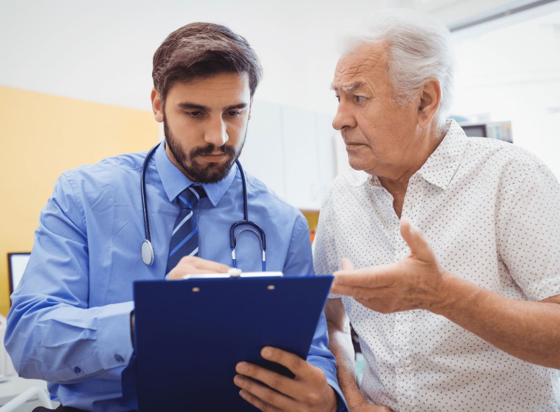 Somali patient and companion meeting a doctor at an Indian hospital to plan treatment